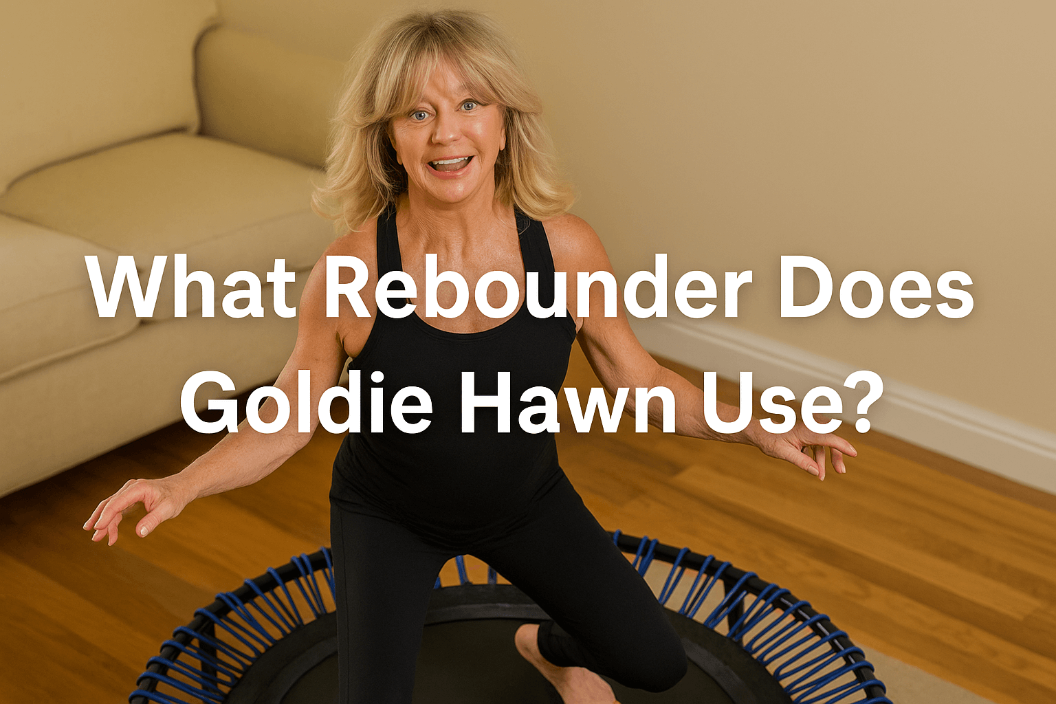 goldie-hawn-bouncing-on-rebounder-trampoline-at-home-smiling-in-workout-clothes-wooden-floor-bright-room