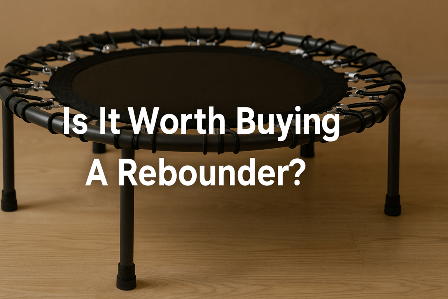 rebounder-trampoline-on-wooden-floor-with-title-is-it-worth-buying-a-rebounder-text-centred-rebounder-trampoline-benefits-uk