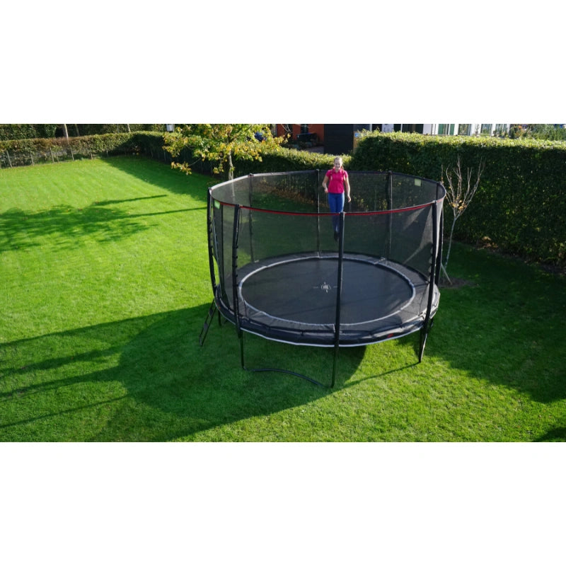 EXIT_Toys_Peak_Pro_Trampoline_10ft_girl_jumping_in_garden