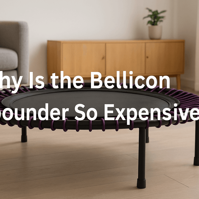 why-is-the-bellicon-rebounder-so-expensive-banner-image-modern-home-gym-setting-mini-trampoline-bungee-cords-purple-design-center-text-clean-wooden-floor-bright-lighting
