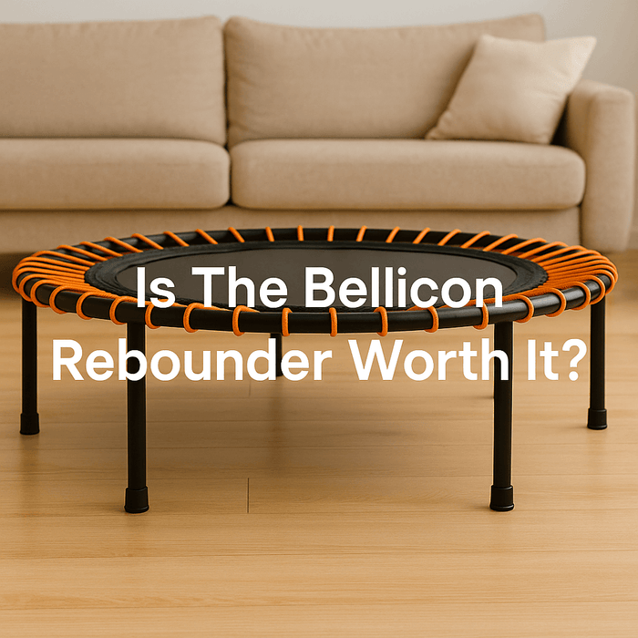 modern-home-rebounder-banner-image-with-wooden-floor-cosy-sofa-orange-bungee-cords-centered-text-is-the-bellicon-rebounder-worth-it