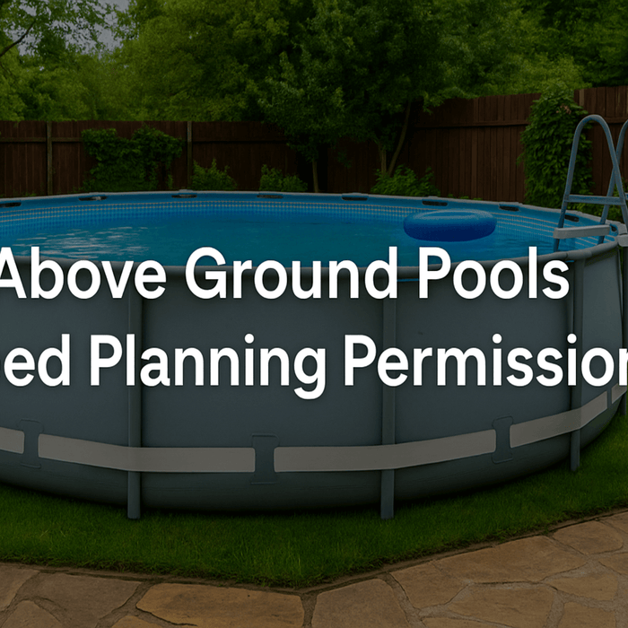 garden-pool-in-backyard-with-wooden-fence-stone-patio-greenery
