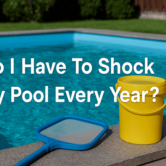 blue-swimming-pool-yellow-shock-container-and-pool-net-on-stone-deck