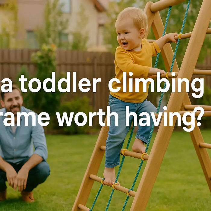 toddler-climbing-a-wooden-frame-in-garden-smiling-parents-watching-with-blog-title-is-a-toddler-climbing-frame-worth-having