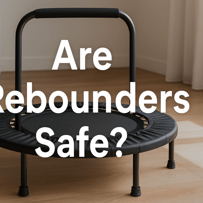 are-rebounders-safe-banner-image-showing-black-mini-trampoline-with-handlebar-in-bright-living-room-with-text-are-rebounders-safe-centered-on-image