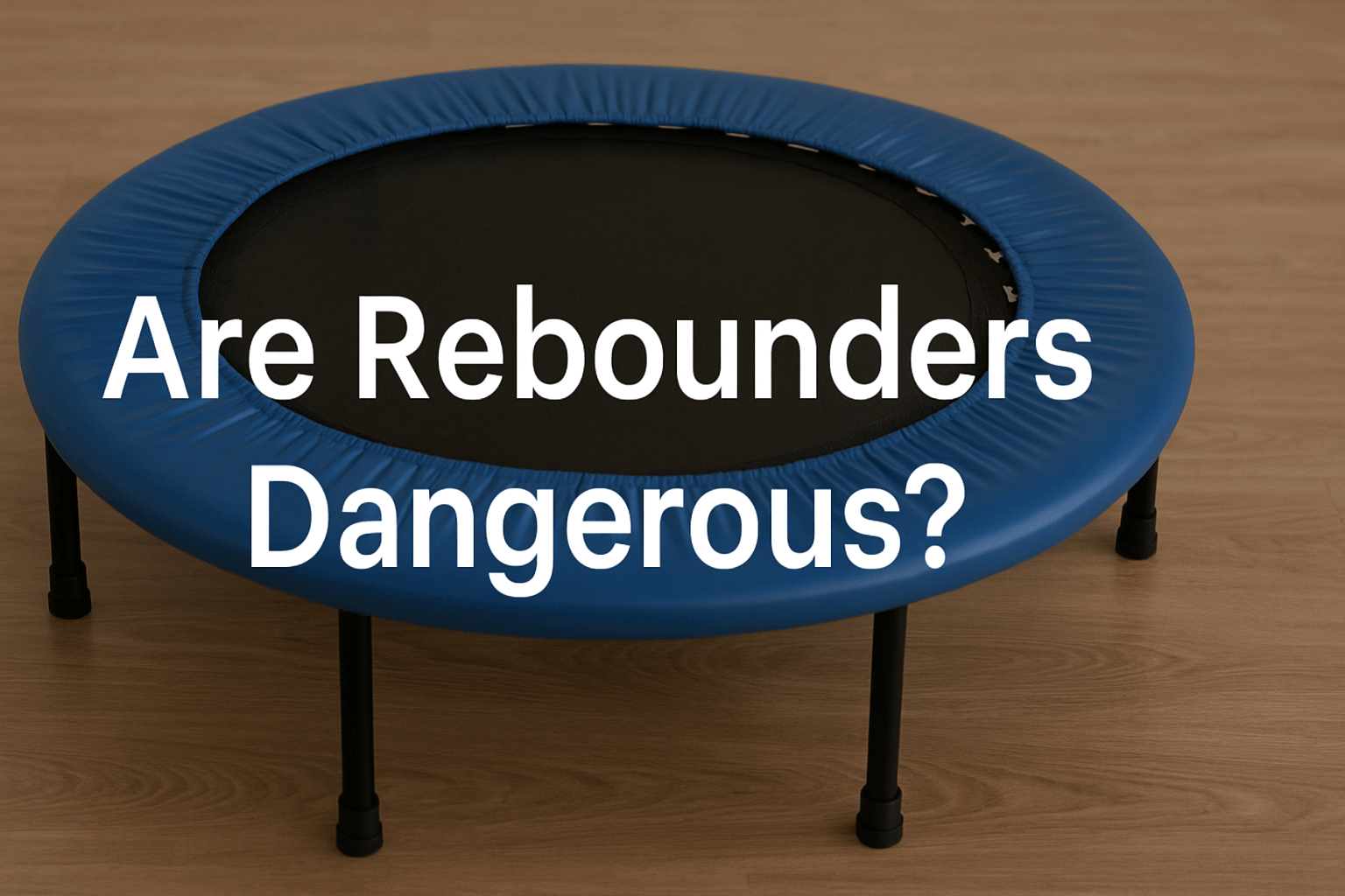 are-rebounders-dangerous-blog-banner-showing-blue-rebounder-uk-on-wooden-floor-with-white-text-title-in-centre