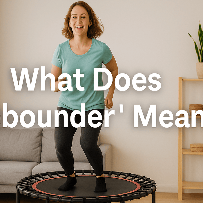 smiling-woman-rebounding-on-mini-trampoline-in-living-room-wearing-turquoise-shirt-and-black-leggings-text-overlay-what-does-rebounder-mean-fitness-exercise-home-workout