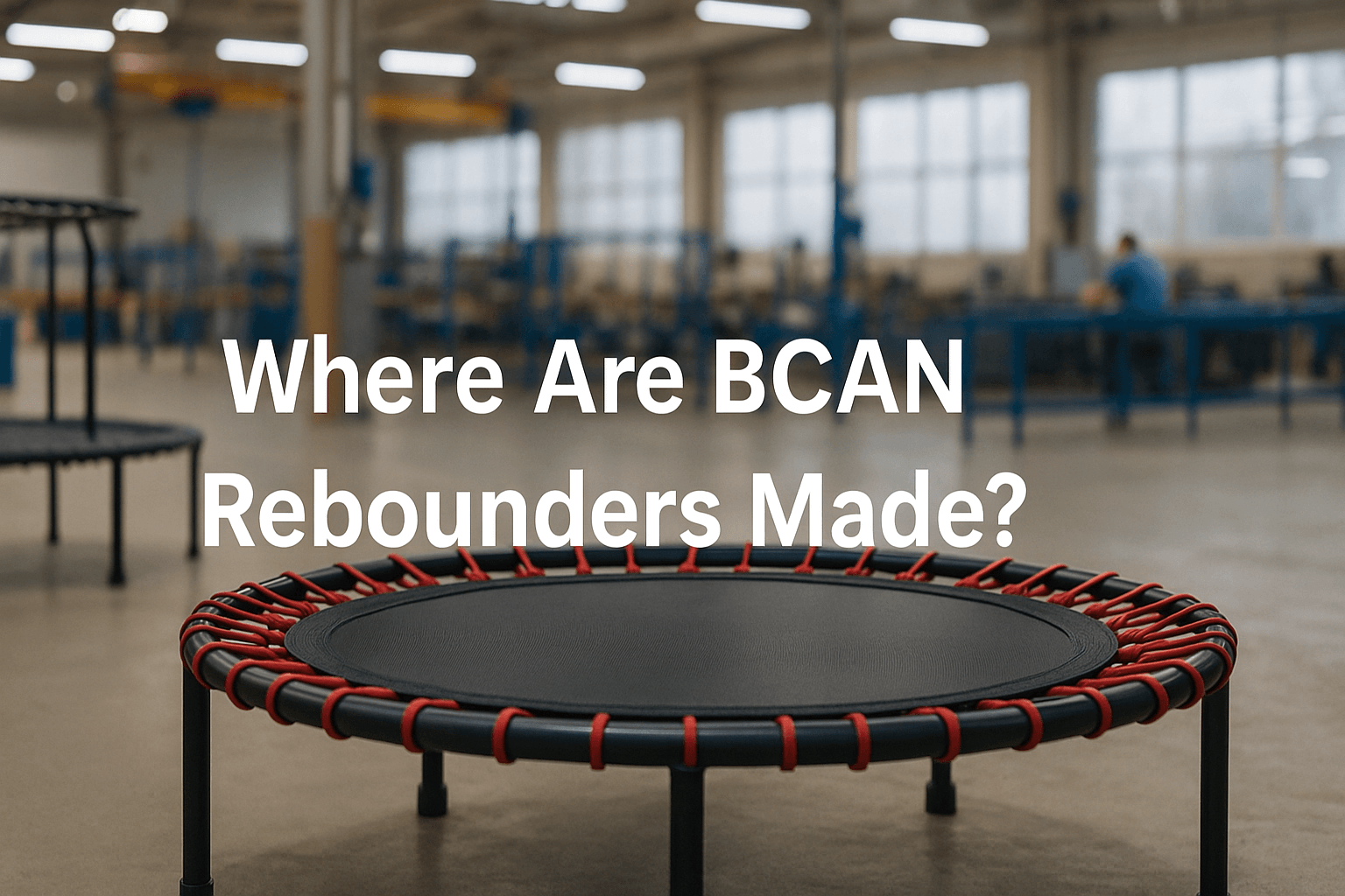 rebounders-trampoline-in-uk-factory-setting-showing-assembly-process-with-red-bungee-cords-and-black-frame-where-are-bcan-rebounders-made-text-centered