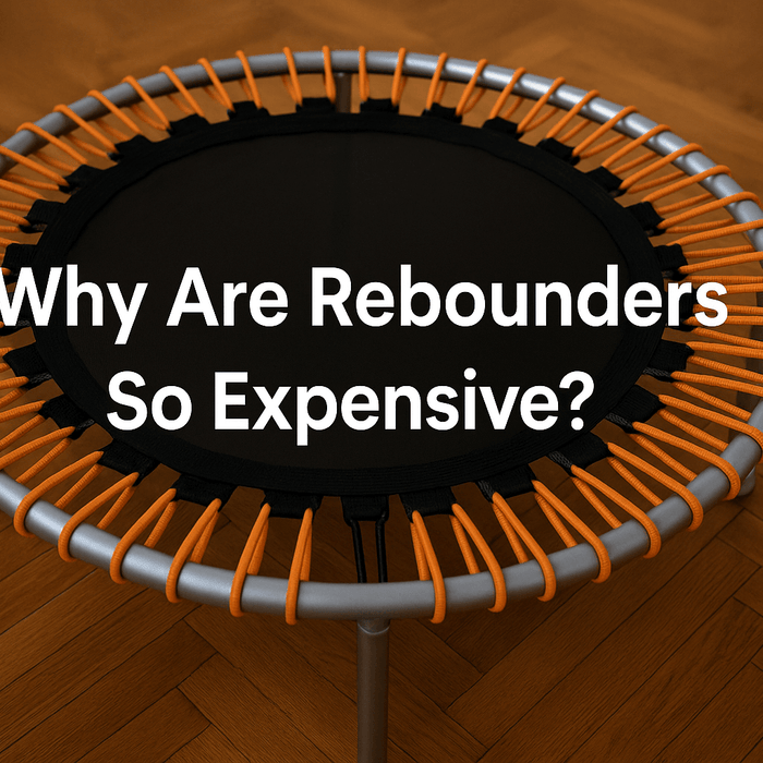 rebounder-trampoline-close-up-on-wooden-floor-with-centre-text-why-are-rebounders-so-expensive