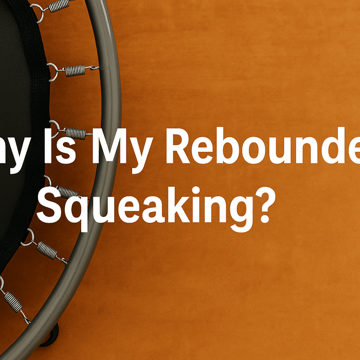 close-up-of-rebounders-trampoline-with-black-mat-and-metal-springs-on-orange-background-center-aligned-text-why-is-my-rebounder-squeaking