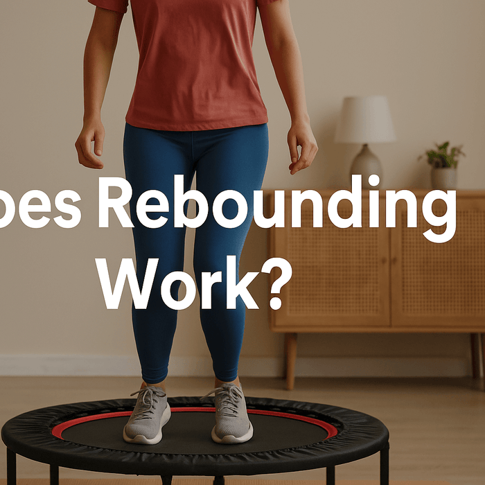 woman-exercising-on-rebounder-trampoline-uk-in-living-room-does-rebounding-work-fitness-bounce-cardio-exercise-low-impact-workout