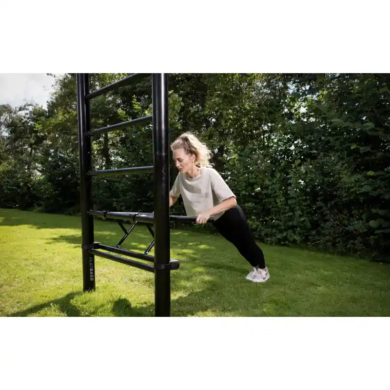 Monkey-bars-for-adults-uk-woman-using-dip-bars