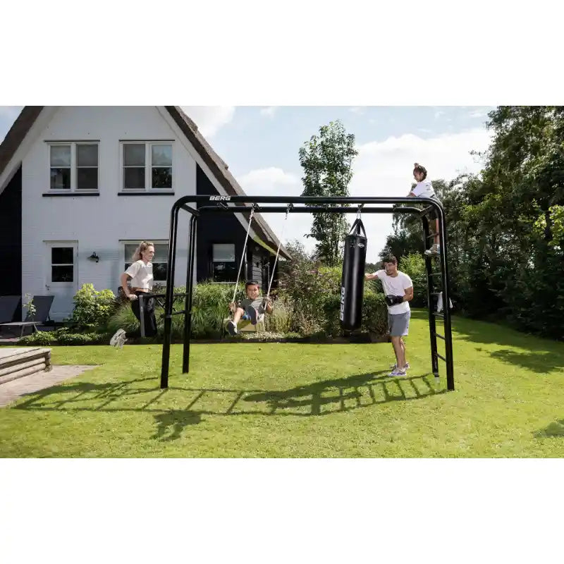 Monkey bars for gym family using the monkey bars together