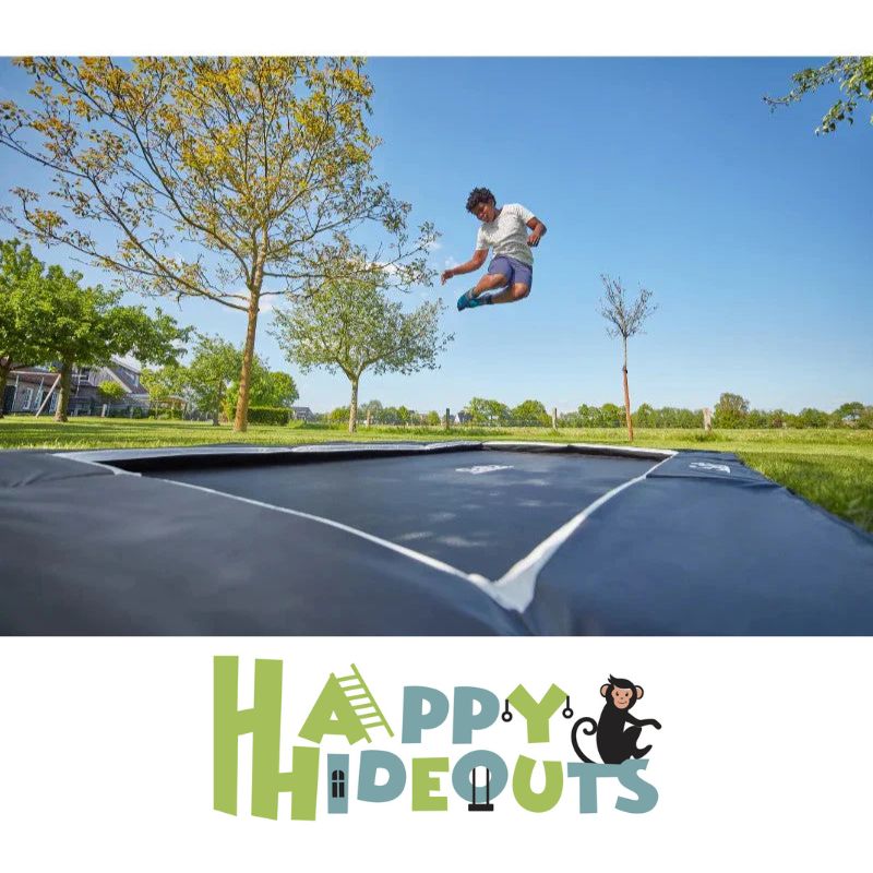 Trampoline-in-ground-boy-bouncing-in-garden