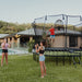 13ft_x_8ft_Springfree_Large_Square_Trampoline_kids_playing_outside