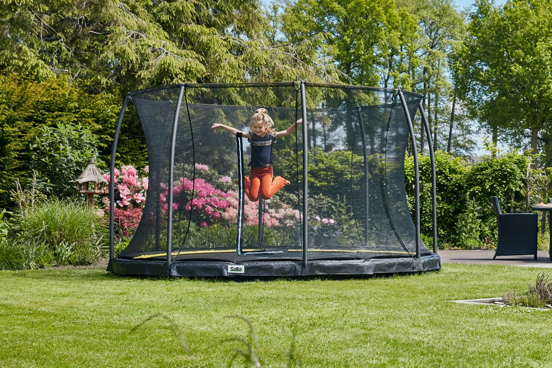 14ft-salta-inground-trampoline-with-child-jumping-in-family-garden