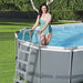 Bestway Power Steel 18' x 9' x 48"/5.49m x 2.74m x 1.22m Oval Pool Set woman