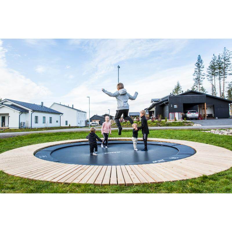 ACON-Air-14ft-Round-Trampoline-in-ground-model-with-child-jumping