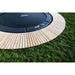 ACON-Air-14ft-Round-Trampoline-in-ground-padding-and-wood-deck-detail