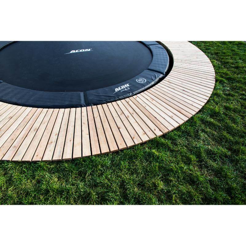 ACON-Air-14ft-Round-Trampoline-in-ground-padding-and-wood-deck-detail