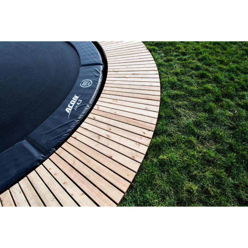 ACON-Air-14ft-Round-Trampoline-pad-logo-close-up-with-wooden-surround