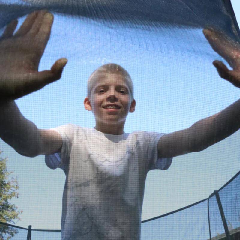 ACON-Air-15ft-Round-Trampoline-safety-net-close-up-with-child-inside