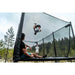 ACON-X-Trampoline-child-flipping-above-safety-net-enclosure