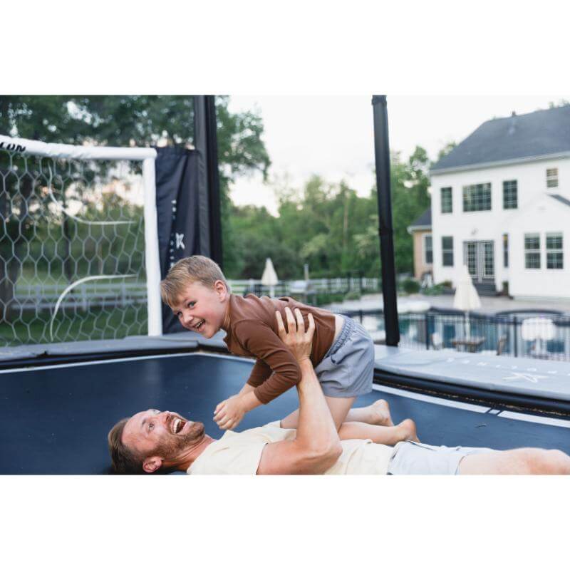 ACON-X-Trampoline-family-play-moment-with-child-and-adult