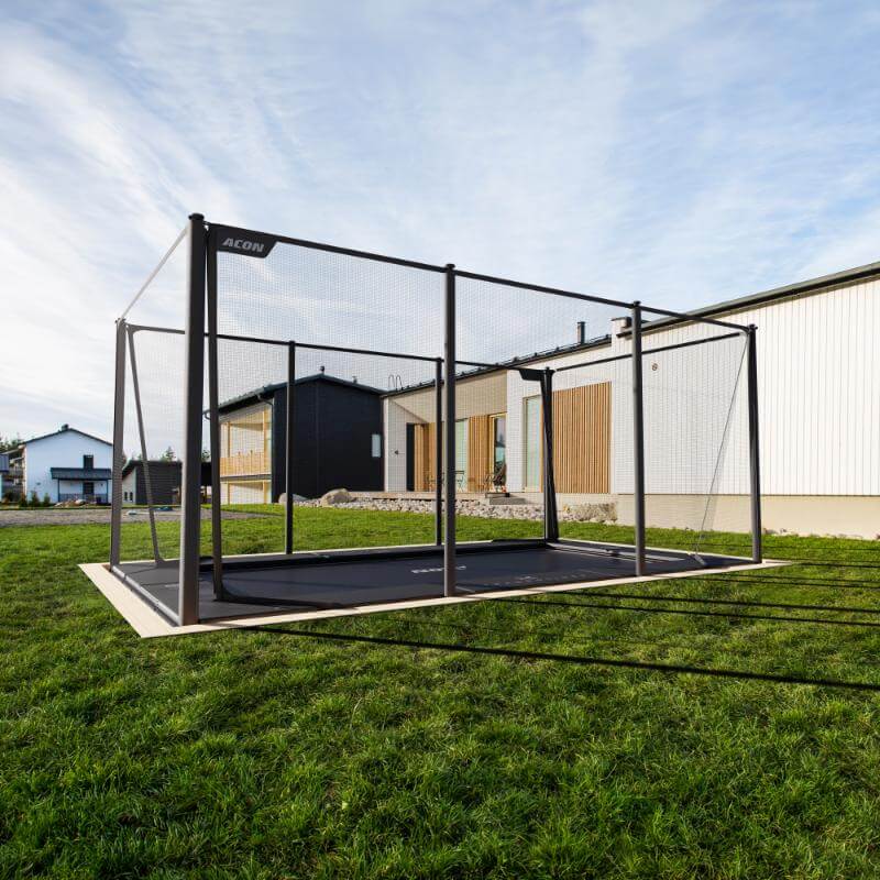 ACON-X-Trampoline-installed-in-garden-with-full-safety-enclosure