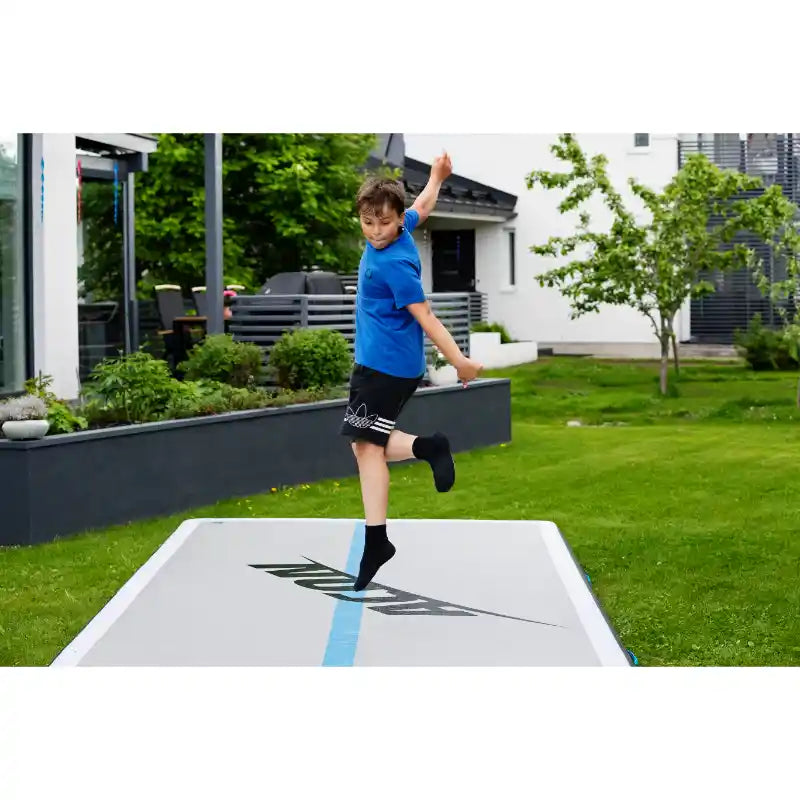 ACON-air-track-in-the-garden-with-boy-playing