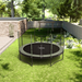 ACON_Air_14ft_Round_Trampoline_garden_view
