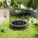 ACON_Air_3.7m_Trampoline_with_safety_net_and_ladder_garden_view