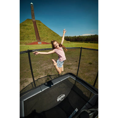 BERG-rectangular-trampoline-girl-outside-playing