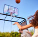 BERG Playbase Basketball Hoop with girl playing in the garden