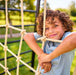 BERG Playbase climbing net with boy enjoying in the garden