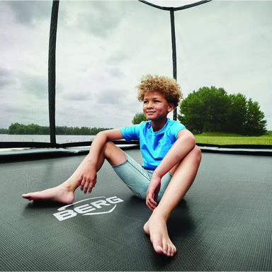 BERG_Trampoline_Elite_12.5ft_Flat_Ground_boy_outside