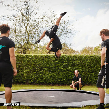 BERG_Trampoline_Elite_380cm_Flat_Ground_man_outside