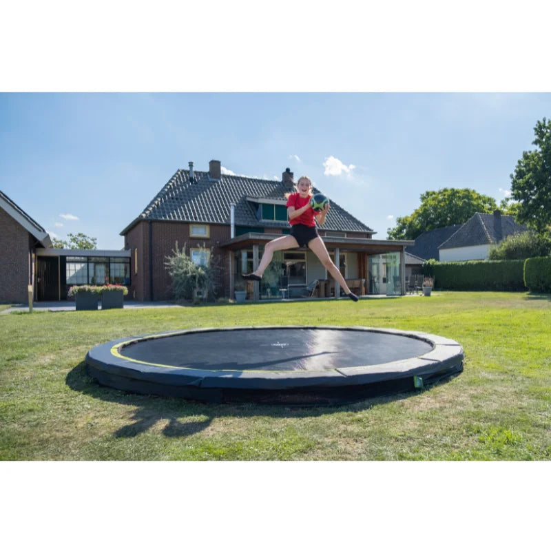 EXIT_Toys_Silhouette_Ground_Trampoline_12ft_girl_jumping