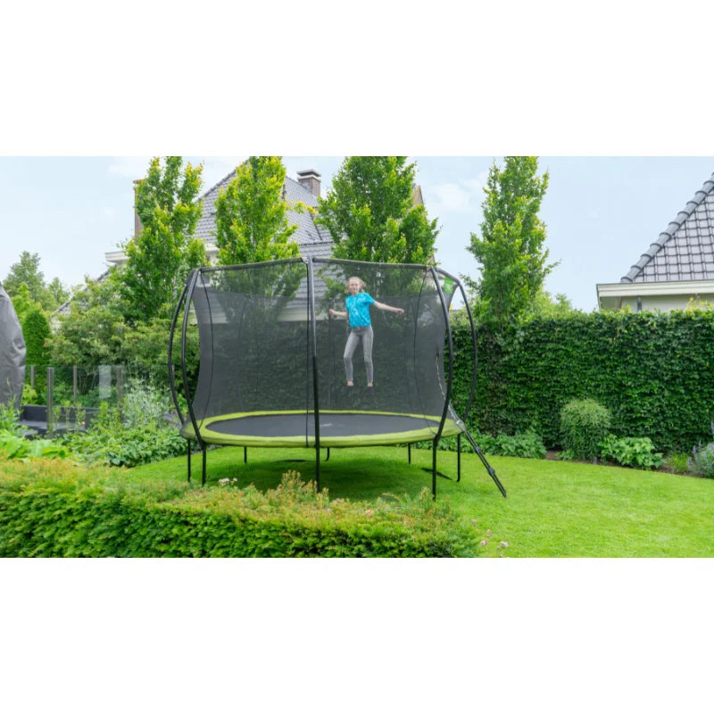 EXIT_Toys_Silhouette__Above_Ground_Trampoline_12ft_green_kid_jumping_outside