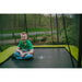 EXIT_Toys_Silhouette__Trampoline_Rectangle_boy_smiling_outside