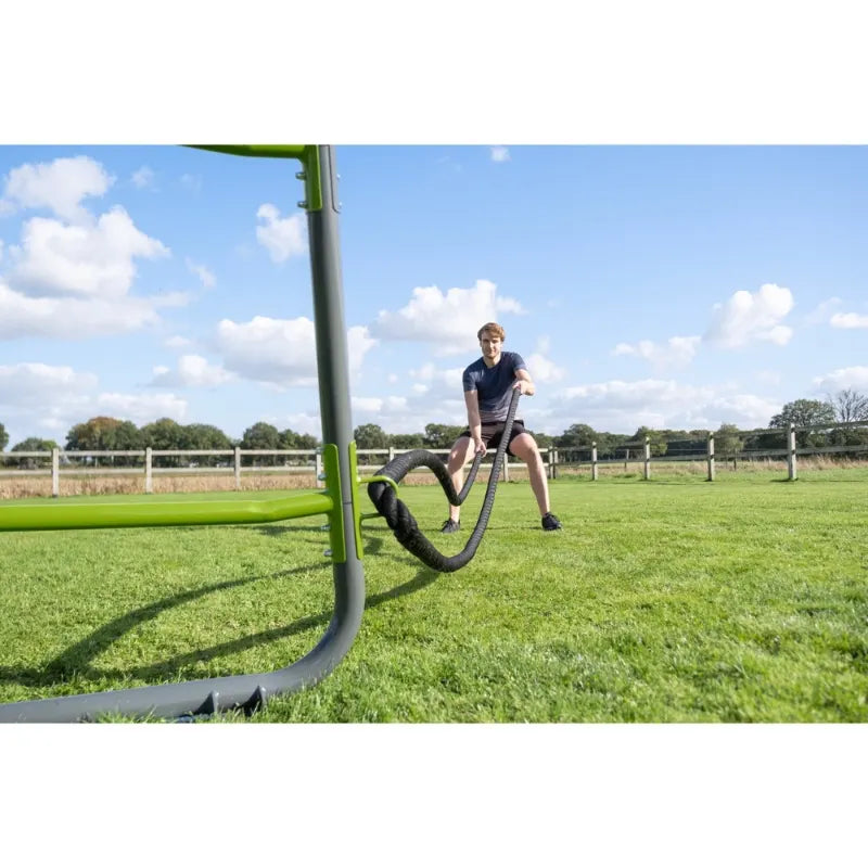 EXIT_battlerope_rings_man_using_battle_ropes