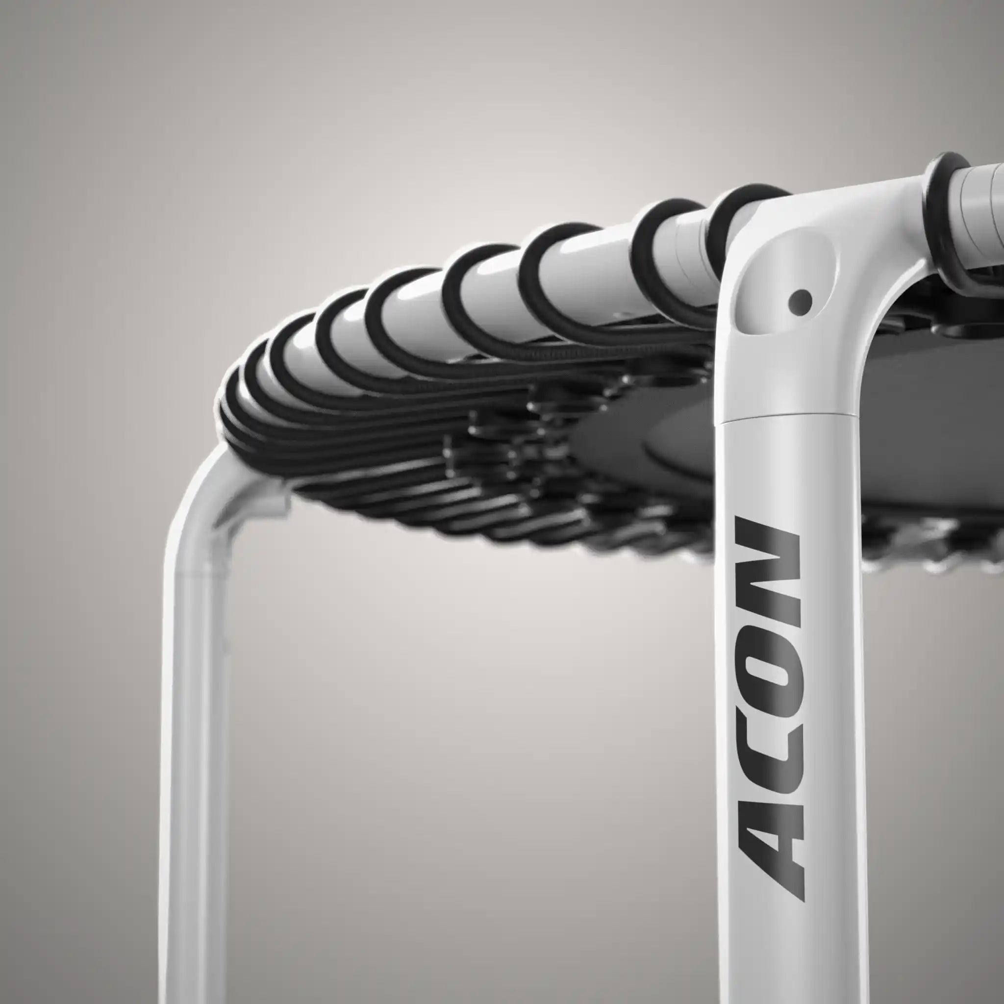 ACON branding on the leg of a white round rebounder