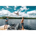 Friends-having-fun-by-lake-with-acon-freestyle-mini-trampoline