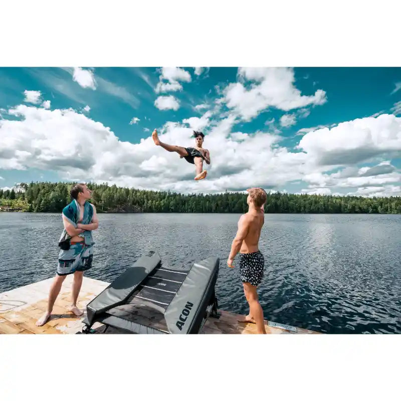 Friends-having-fun-by-lake-with-acon-freestyle-mini-trampoline