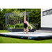 Girl-doing-a-cartwheel-on-a-ACON-air-track