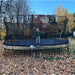 Jumbo_Oval_Springfree_Trampoline_girl_playing_side_view