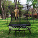 Mini_Round_Springfree_Trampoline_girl_playing_outside