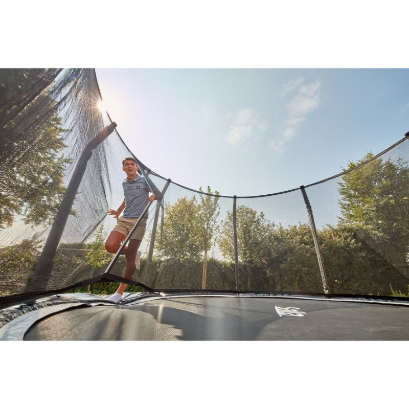 Salta_12ft_Round_Trampoline_Weatherproof_Pad_man_outside