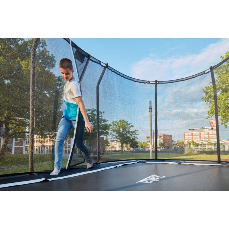 Salta_13x8ft_Premium_Black_Trampoline_Modern_Design_man_playing