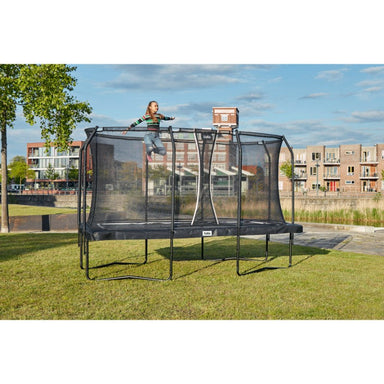 Salta_Premium_Black_Rectangular_Trampoline_10x7ft_girl_outside